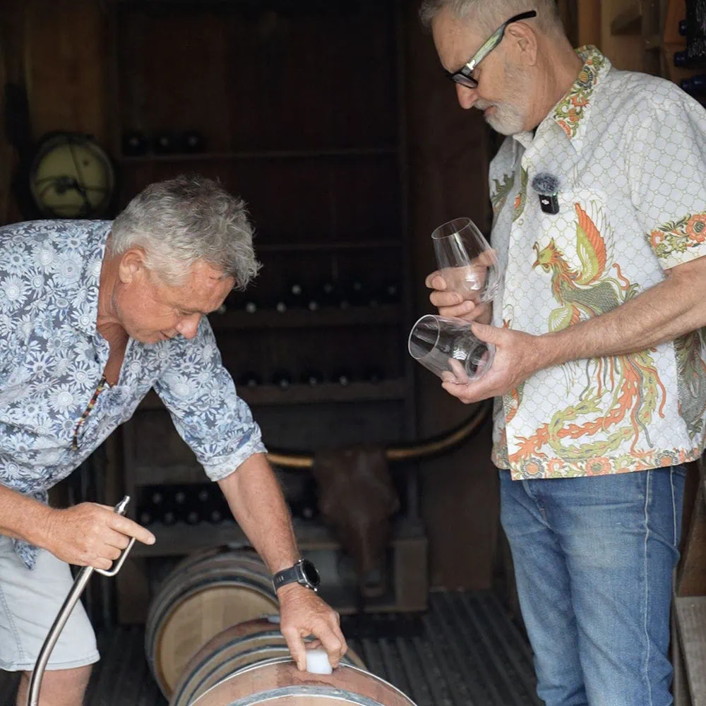 Bayden Wilson and Gordon Russell doing wine tastings in the cellar of Kiwiesque.