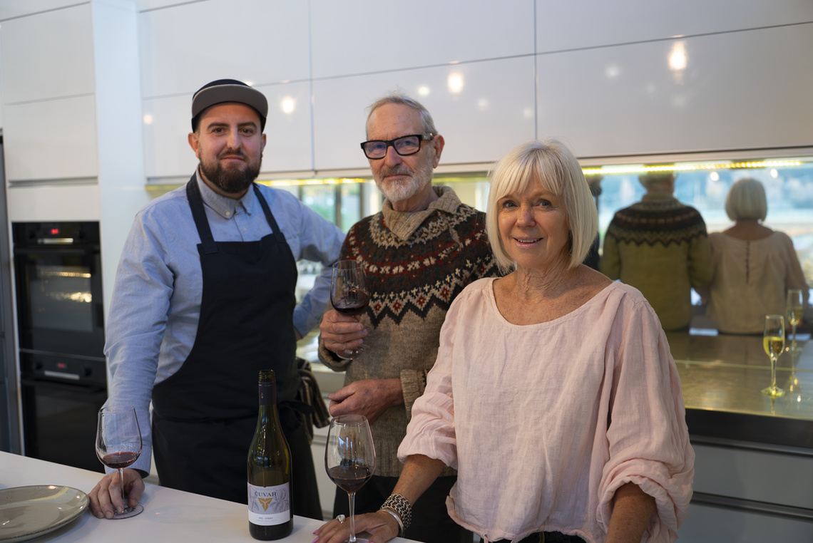 Chef Simon Lillico, Winemaker Gordon Russell and Host Justine Wilson standing together in the kichen at a Kiwiesque Winter Food and Wine